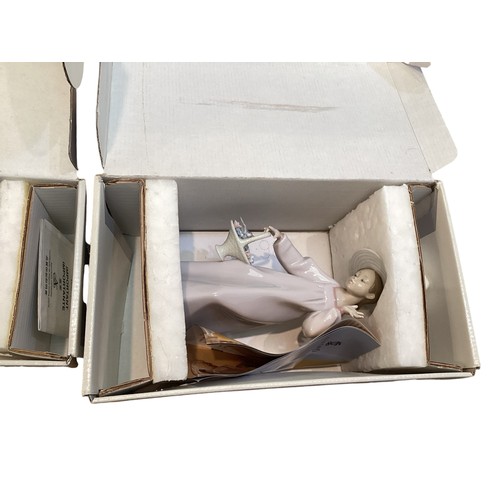 387 - Three boxed LLadro figures together with a collection of boxed Doulton, Wedgwood and Swarovski items... 