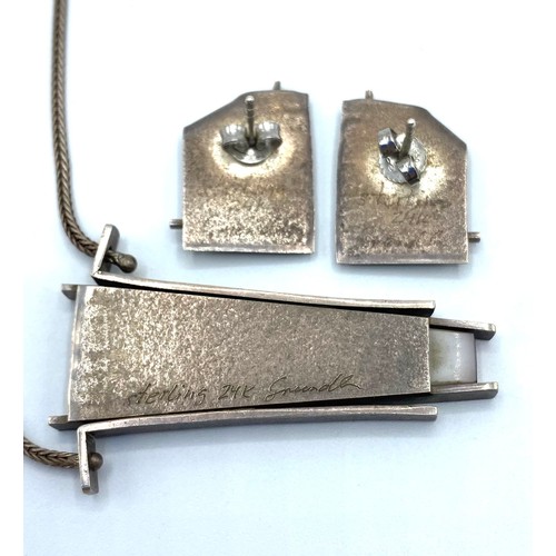 52 - A sterling silver and 24ct gold mid C20th abstract necklace pendant and earing suite marked Sterling... 