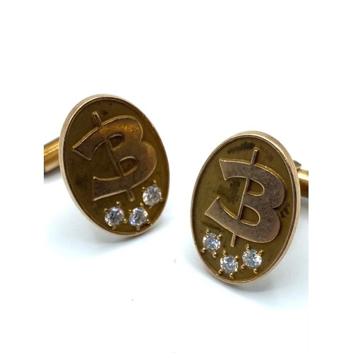 31 - Pair of 14 ct gold gentleman's cufflinks, oval plaque front set with brilliant cut diamonds 12.8 g