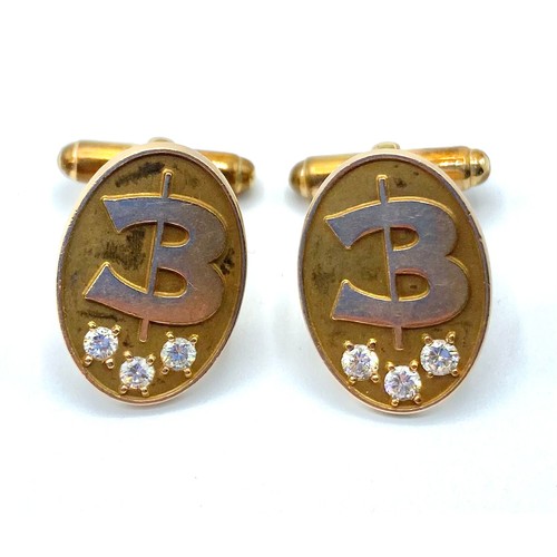 31 - Pair of 14 ct gold gentleman's cufflinks, oval plaque front set with brilliant cut diamonds 12.8 g