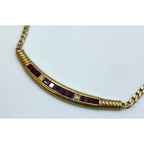 51 - A 14ct gold flat fancy link necklace with integral ruby set pendant 8.8 g, 39 cm