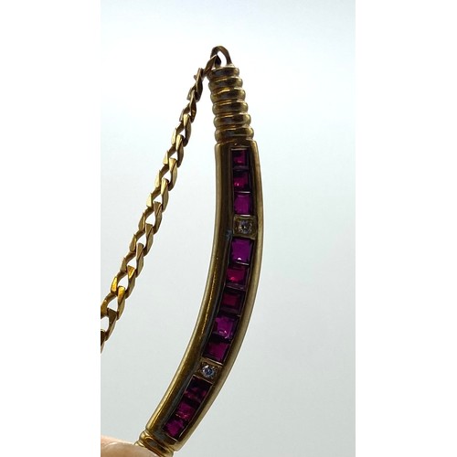 51 - A 14ct gold flat fancy link necklace with integral ruby set pendant 8.8 g, 39 cm