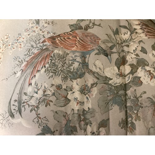 580 - A traditional three seater sofa, upholstered in a floral and bird themed fabric, in used condition, ... 