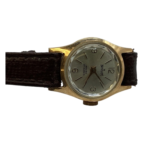 107 - An 18ct gold cased Lady's watch by Nissim on a leather strap. Case. 18mm. Together a 9ct gold cased ... 