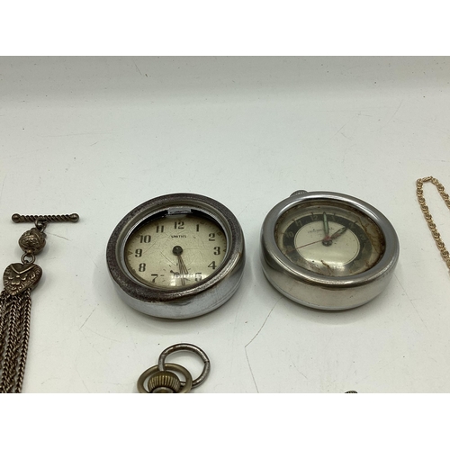 108 - A collection of watches and time pieces to include a 935 silver cased key wind pocket watch