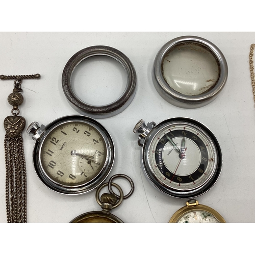 108 - A collection of watches and time pieces to include a 935 silver cased key wind pocket watch