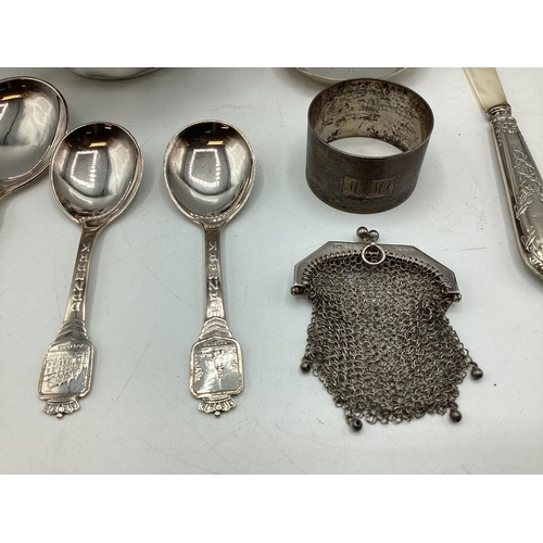 17 - A collection of sterling silver, unmarked white metal and continental white metal items to include a... 