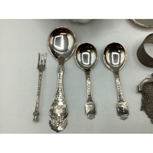 17 - A collection of sterling silver, unmarked white metal and continental white metal items to include a... 