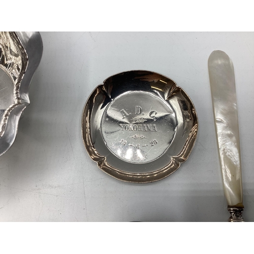 17 - A collection of sterling silver, unmarked white metal and continental white metal items to include a... 