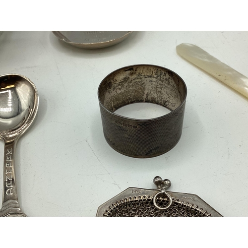 17 - A collection of sterling silver, unmarked white metal and continental white metal items to include a... 