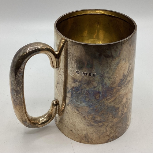 201 - A sterling silver mug with inscription for Captain ME Dunbar-Nasmith VC.CB.RN. Victoria Cross awarde... 