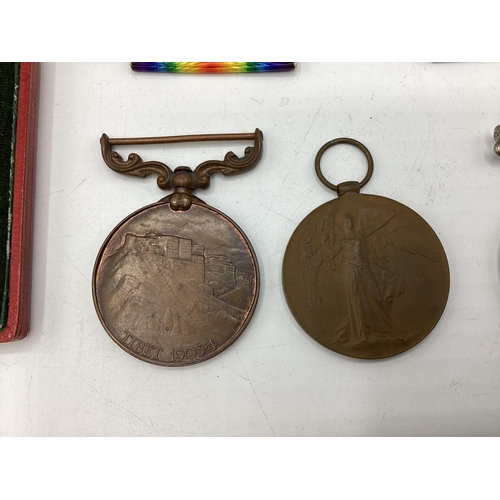 204 - A collection of World war I medals to Captain CH Ker, together with an Edward VII Tibet 1903-1904 me... 