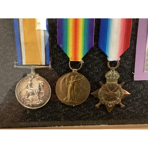 206 - A framed collection of First and Second World war Medals to the Akers family. WWI Trio, WWII Africa ... 