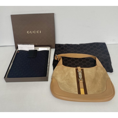 253 - GUCCI, ladies tan shoulder bag, and dust bag,  number 001.3306002058, in used condition, some slight... 