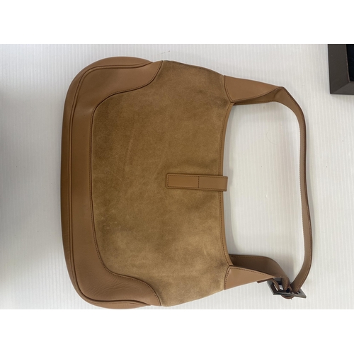 253 - GUCCI, ladies tan shoulder bag, and dust bag,  number 001.3306002058, in used condition, some slight... 