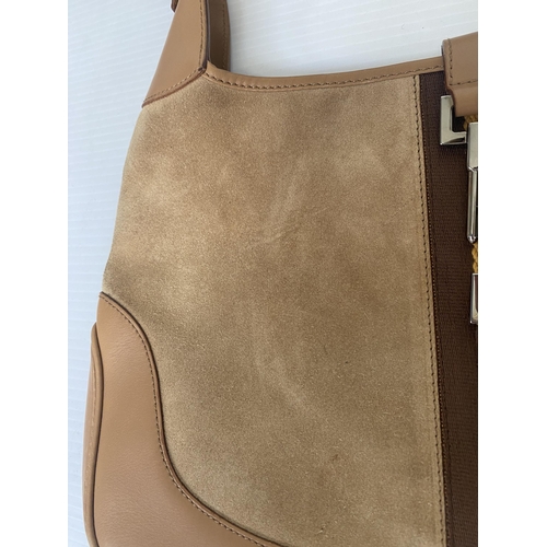 253 - GUCCI, ladies tan shoulder bag, and dust bag,  number 001.3306002058, in used condition, some slight... 