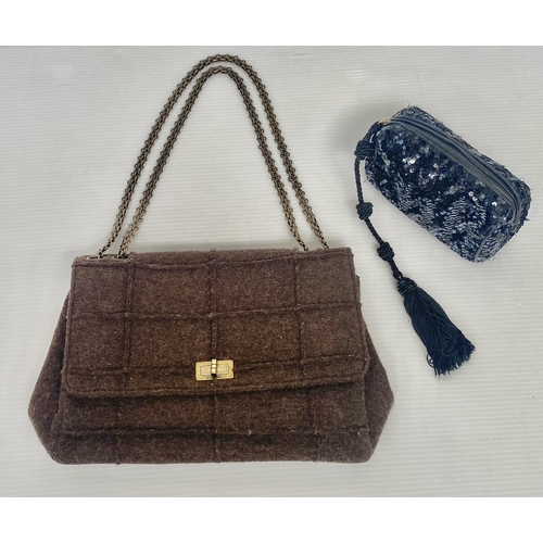 254 - CHANEL, a brown fabric handbag, with original authentication card in envelope, number 5834568, and a... 