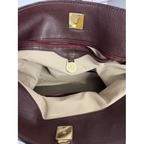 269 - MULBERRY, ladies burgundy shoulder bag, number 2169523,with original dust bag, shopping bag, and env... 