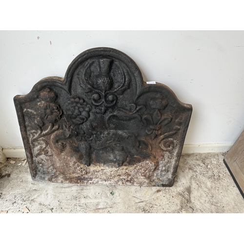 350 - Heavy cast iron fire back illustrated with fleur de lisle pattern 74 cm width x 65 cm h