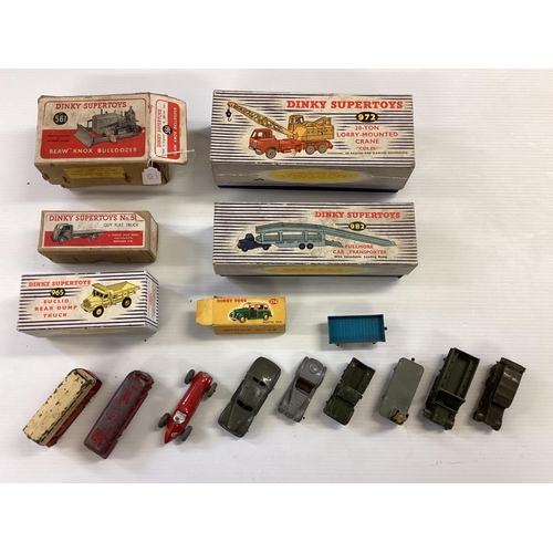 424 - A collection of six boxed Dinky toy trucks and cars to include Guy Flat truck No51, Austin Taxi No25... 