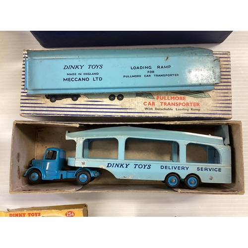 424 - A collection of six boxed Dinky toy trucks and cars to include Guy Flat truck No51, Austin Taxi No25... 