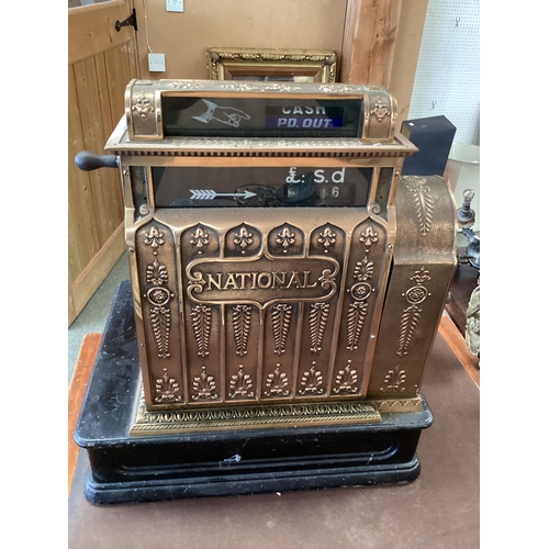 428 - An American brass National cash register. Generally in working order. Keys depress well and handle t... 