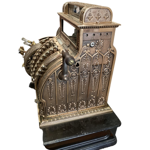 428 - An American brass National cash register. Generally in working order. Keys depress well and handle t... 