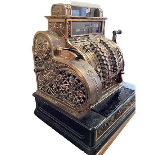 428 - An American brass National cash register. Generally in working order. Keys depress well and handle t... 