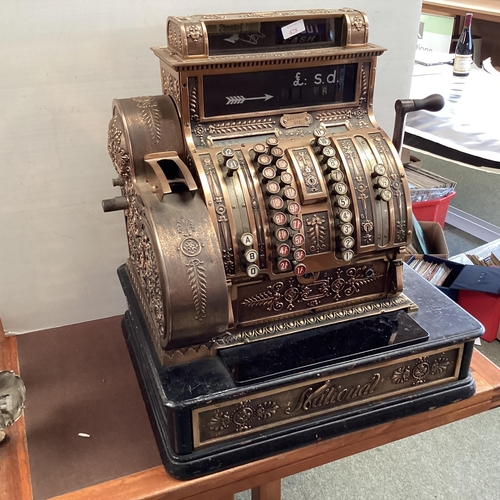 428 - An American brass National cash register. Generally in working order. Keys depress well and handle t... 