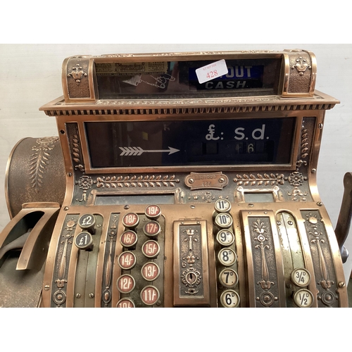 428 - An American brass National cash register. Generally in working order. Keys depress well and handle t... 