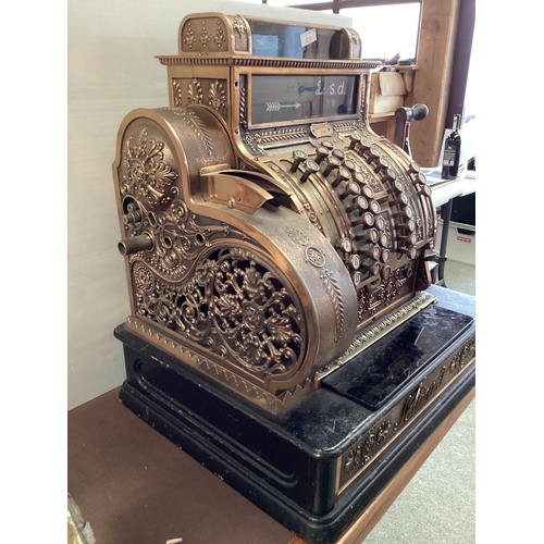 428 - An American brass National cash register. Generally in working order. Keys depress well and handle t... 