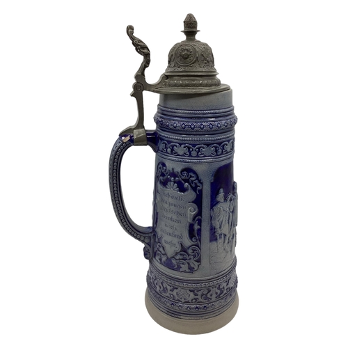 457 - A large stoneware German Beer Stein with pewter lid. 40cm(h)