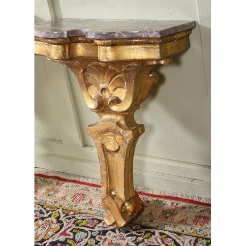 460 - A NEAR SET OF THREE GILTWOOD AND MARBLE TOPPED CONSOLE TABLES ITALIAN, INCORPORATING 19TH CENTURY EL... 