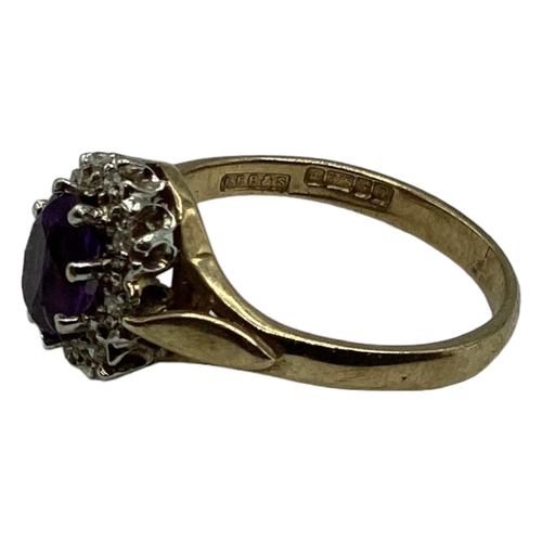 5 - A 9ct gold amethyst and diamond ring. Central oval free cut amethyst with a surround of single cut d... 