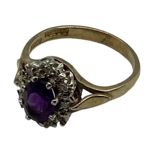 5 - A 9ct gold amethyst and diamond ring. Central oval free cut amethyst with a surround of single cut d... 