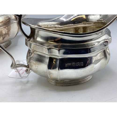 70 - A sterling silver tea pot and cream jug in Mappin and Webb presentation case(missing sugar) by Mappi... 