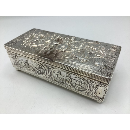 89 - A sterling silver jewellery casket with repousse scene of 17th century gentleman and countryside sce... 