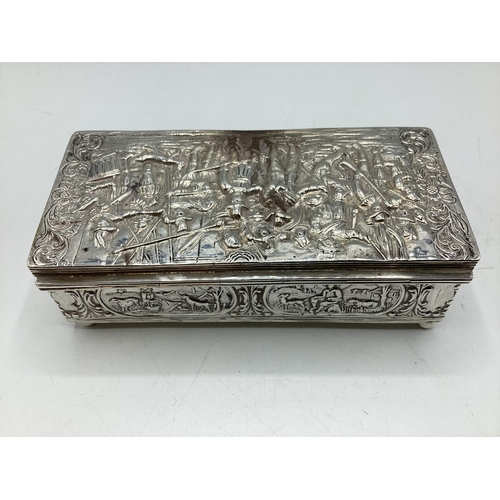 89 - A sterling silver jewellery casket with repousse scene of 17th century gentleman and countryside sce... 