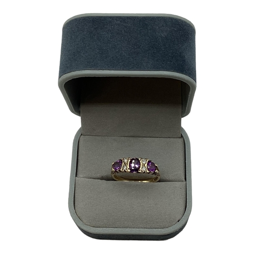 96 - A 9ct gold amethyst and diamond ring . Three oval free cut amethysts with single cut diamond accents... 