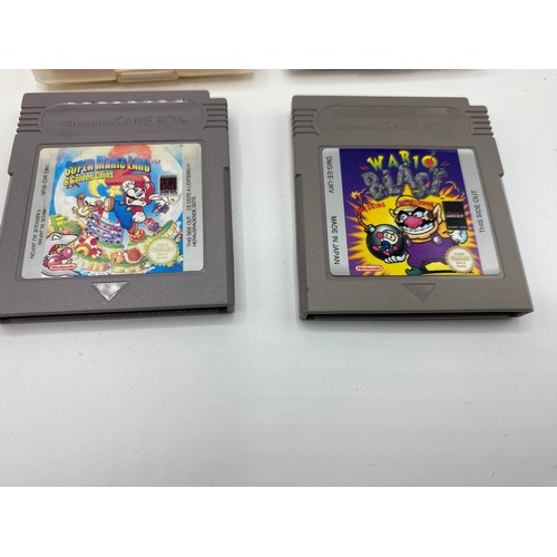 353 - Game boy with original carry case and games.  Super Mario Land 6 Golden Coins, Donkey King Land 2, E... 