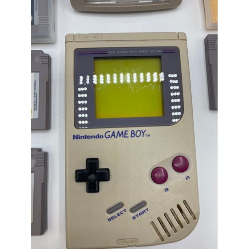 353 - Game boy with original carry case and games.  Super Mario Land 6 Golden Coins, Donkey King Land 2, E... 