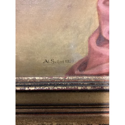 492 - A pair of gilt framed portraits, of a seated gentleman and lady, and bears signature lower left Al. ... 