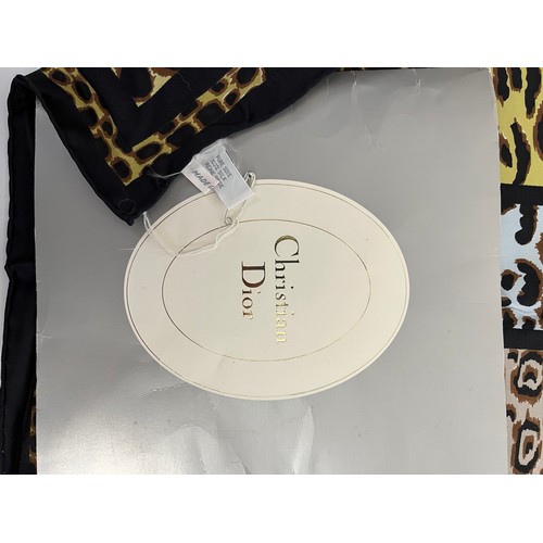 249 - CHRISTIAN DIOR silk scarf in good condition with original packaging.