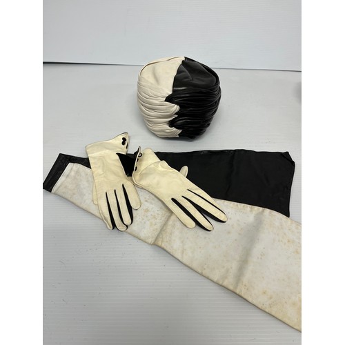 287 - A quantity of hats to include a leather black and white Frederick Fox and matching gloves and belt; ... 