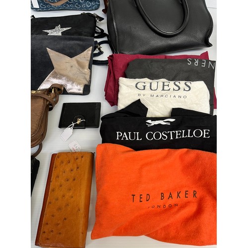 273 - A quantity of handbags and wallets, to include Paul Costelloe, with dust bag; Calvin Klein; Guess (t... 