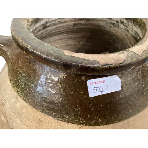 541 - A large bulbous teracotta olive pot /garden urn with two handles and etched decoration, rustic and r... 