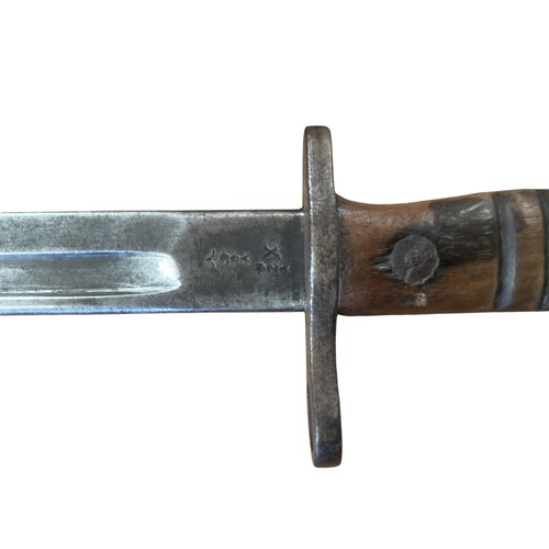 191 - A 1913 pattern Remington bayonet with scabbard and frog. 55cm together with a British stick bayonet.