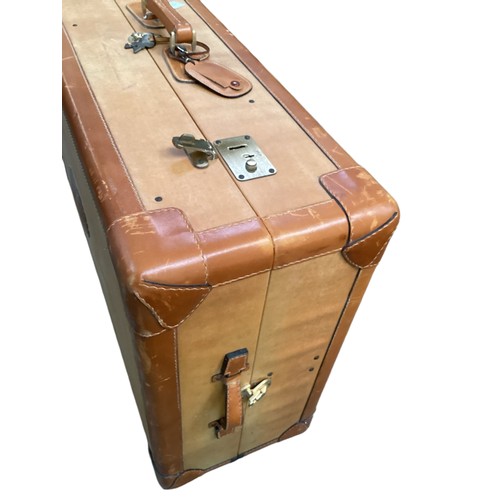 177 - Luggage: A large brown leather and canvas travel cabin trunk with fitted interior and keys, 90cm Wid... 