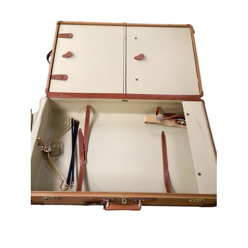 177 - Luggage: A large brown leather and canvas travel cabin trunk with fitted interior and keys, 90cm Wid... 