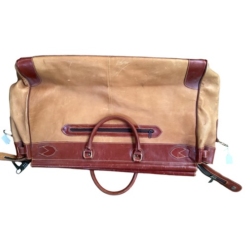 177 - Luggage: A large brown leather and canvas travel cabin trunk with fitted interior and keys, 90cm Wid... 